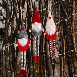 Set of three Scandinavian Christmas gnomes with long legs and starry hats for holiday decor