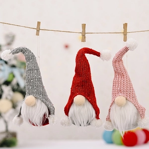 Three sequined Christmas gnome hanging decorations with long beards and pointed hats