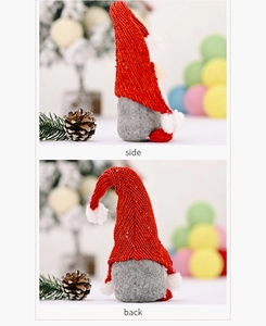 Details der Seiten- und Rückansicht eines roten gestrickten Weihnachts-Wichtel-Plüschs