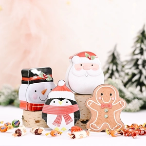 Cartoon Christmas tin boxes featuring Santa Claus and snowman for holiday candy gifts