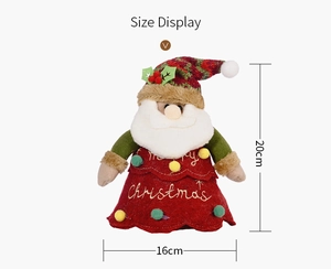 Size display of a 20cm Santa Claus fabric figurine with Merry Christmas embroidery