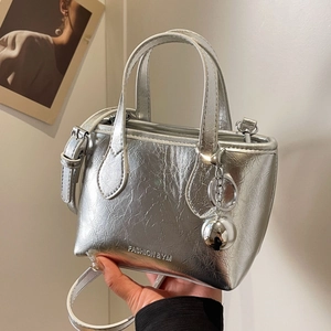 Minimalist PU Leather Bucket Bag For Women Metallic Glossy Pleated Design Casual Shoulder Crossbody Bag With Ball Pendant