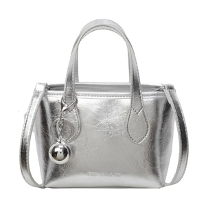 Silver metallic pleated tote bag with detachable strap and spherical mirror charm