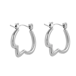 Close-up of silver wavy hoop earrings with minimalist irregular heart-shaped design