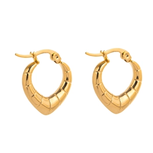 Detailed view of golden heart-shaped hoop earrings with refined horizontal texture
