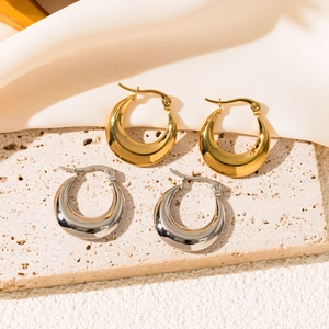 Chunky geometric stainless steel hoop earrings set in polished gold and silver finish