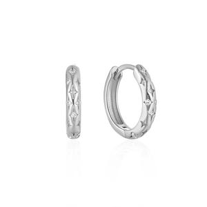 Elegant silver star engraved hoop earrings with sparkling cubic zirconia on white background