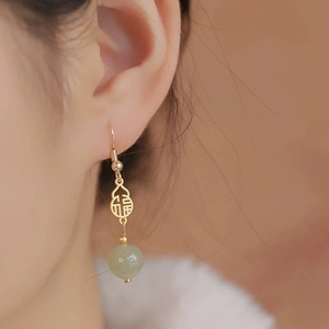 Gold gourd earrings with 福 character and green jade bead in elegant Chinese style
