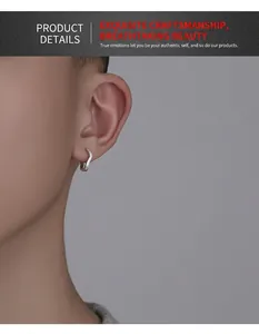 Detail of silver wavy hoop earring with paved zircon stones shown on ear model