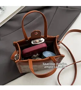 Top view showing the spacious interior of the brown plaid tote bag with daily essentials