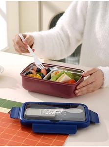 Vue détaillée de la boîte à lunch en acier 304 avec compartiments et rangement de couverts