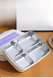 Detail showing the SUS304 stainless steel interior of a four-compartment lunch box
