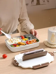 Detail view of 4-compartment stainless steel bento box with lid phone holder and soup jar