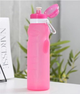 Pink silicone folding water bottle with metal carabiner for outdoor hiking activities