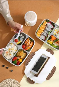 Detail of 304 stainless steel bento box with built-in cutlery storage and phone holder lid