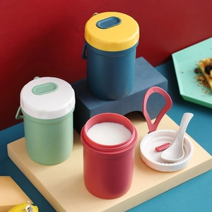 Close-up of portable insulated 304 stainless steel breakfast cups with handles and spoons