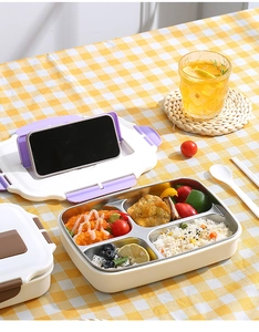 Detail of 304 stainless steel lunch box with lid used as a folding phone holder stand