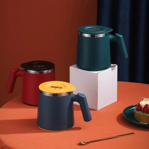 Three matte 304 stainless steel insulated mugs with lids and ergonomic handles in deep colors