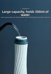 Detail view of 500ml light blue silicone water bottle with spiral texture and pouring water