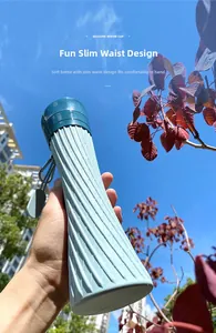 Blue silicone collapsible bottle with spiral grip and carabiner for outdoors