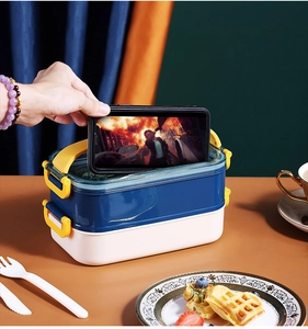 Boîte à déjeuner double couche avec fermoirs jaunes et couvercle porte-téléphone