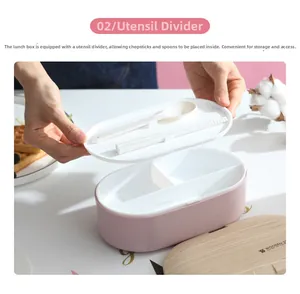 Detail showing the utensil storage divider with spoon and chopsticks in a pink lunch box