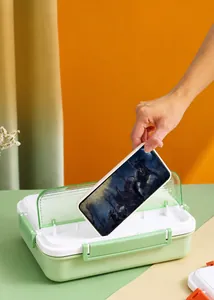 Detailansicht des Brotdosendeckels mit integriertem Handyhalter für bequemes Videoschauen