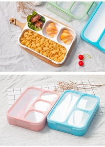 Three-compartment bento box with pink, blue, and green lids plus matching spoon detail