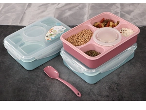 Détail de la boîte à bento à 4 compartiments avec cuillère rose et couvercle hermétique
