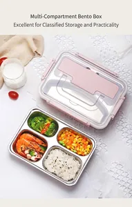Detail of four-compartment stainless steel lunch box with rice, shrimp, and vegetables