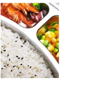 Detail of partitioned 304 stainless steel lunch box with rice, shrimp and vegetables