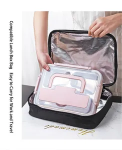Close-up of placing a pink insulated lunch box into a matching thermal carry bag