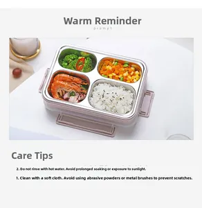 Detailed view of four-compartment stainless steel lunch box with pink exterior shell