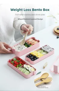 Three-layer eco-friendly wheat straw lunch box in pink with cutlery and food compartments