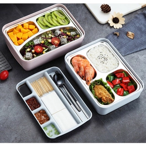 Detail of 304 stainless steel lunch box interior with multi-compartment food tray