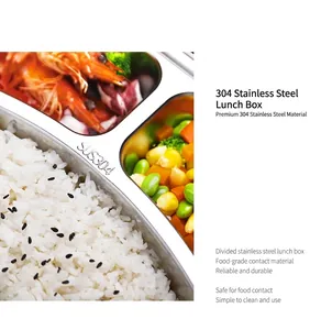 Macro view of 304 stainless steel food compartments with rice and fresh shrimp