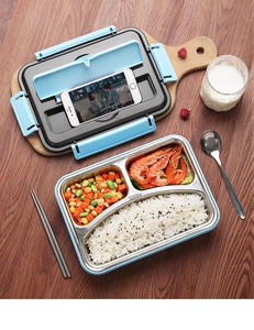 Close-up of a 304 stainless steel lunch box with built-in phone holder lid design