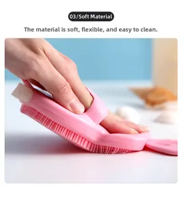 Detail showing flexible pink silicone bristles being bent to show soft texture