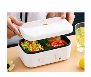 Detail view of electric lunch box with wood-texture lid and temperature display
