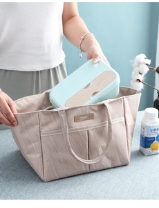 Detail of insulated lunch bag featuring wood grain lid and durable textured fabric