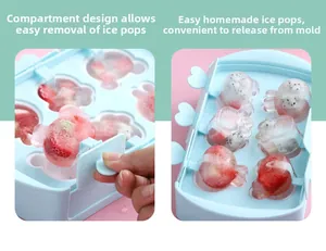 Detail of separate silicone popsicle molds with heart handles and fruit-filled ice pops