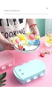 Detail of pink and blue silicone popsicle molds with heart-shaped handles and animal shapes