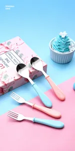 Detailed view of pink and blue 304 stainless steel kids spoon and fork set with handles