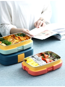 Detailed top view of 304 stainless steel lunch box with pasta and fruit salad