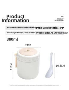 Macro shot of 380ml minimalist breakfast cup with lid, handle, and matching white spoon