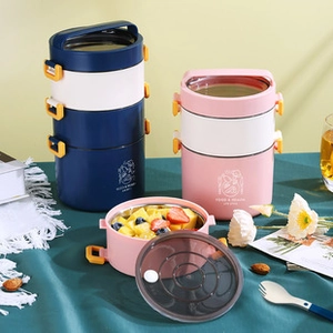 Detail of stacked multi-layer lunch boxes with food-grade stainless steel interior
