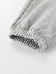 Pantalon de sport gris chiné pour enfants avec chevilles côtelées élastiques en coton premium