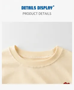 Close-up of the ribbed crew neck and fine knit texture of this light beige summer T-shirt