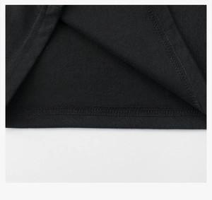 Detail of boys' black cotton T-shirt showing high-quality double-needle hem stitching