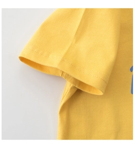 Detailed close-up of yellow cotton t-shirt sleeve with reinforced double-stitch finish